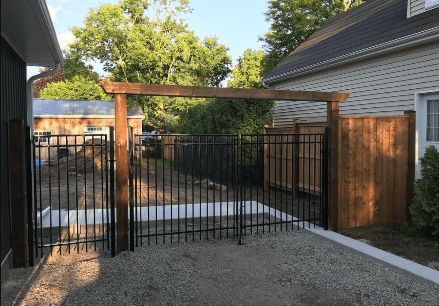 Wood fence with gate in Welland